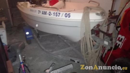 BARCA RIGIDA CON MOTOR Y REMOLQUE