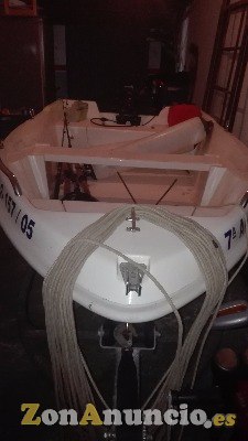BARCA RIGIDA CON MOTOR Y REMOLQUE