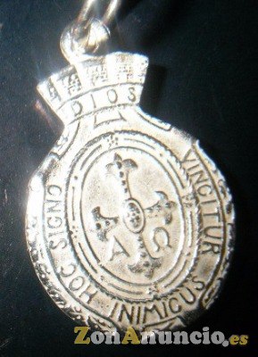 MEDALLA Y CRUZ VIRGEN DE COVADONGA EN ORO Y EN PLATA.