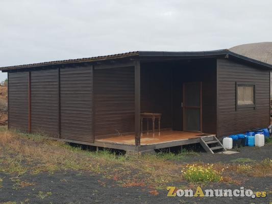 VENDO TERRENO CON VIVIENDA DE MADERA DE 64 m2