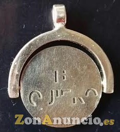 COLGANTE Moneda Giratoria mensaje oculto